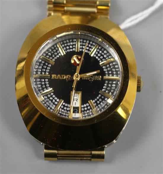 A gentlemans gilt stainless steel Rado Diastar automatic day/date wrist watch.